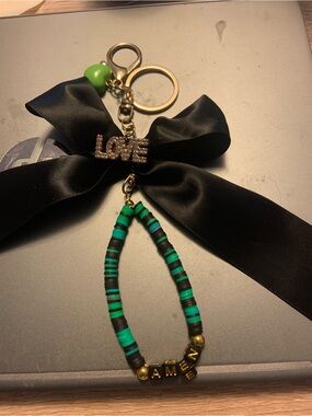 Black Satin Bow Keychain with Green Bead and Striped Tassel